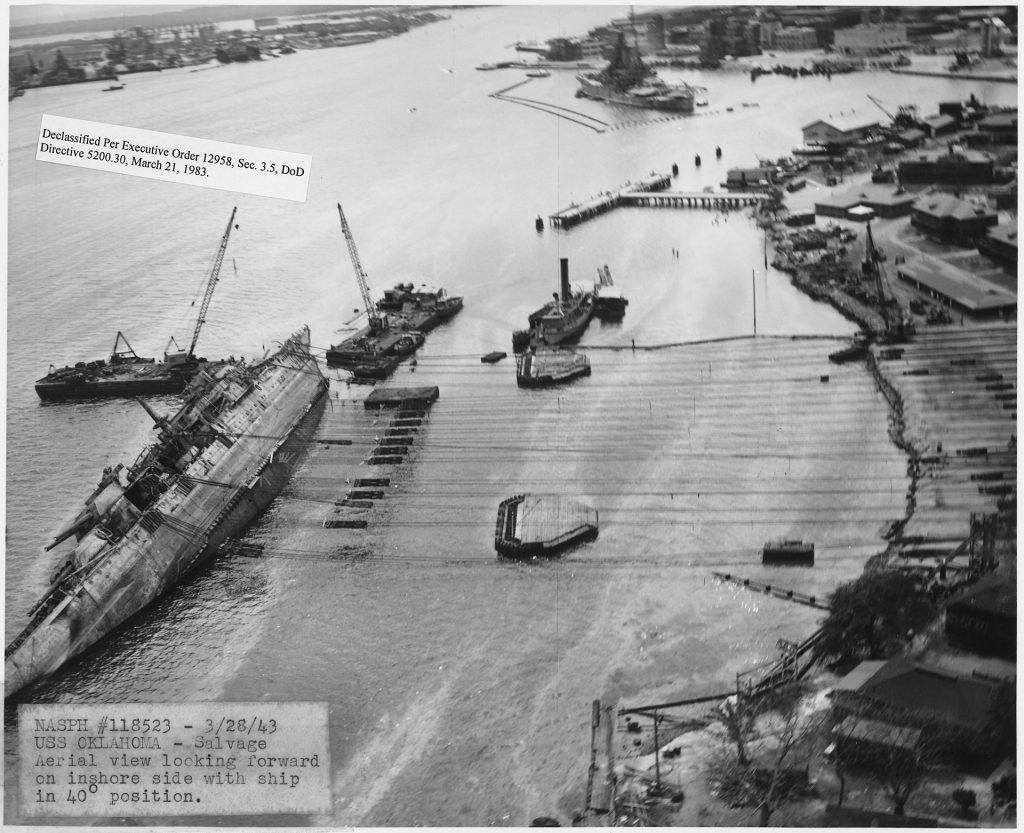 A view of the Oklahoma after reaching 40 degrees as she is righted by the derricks,
